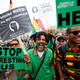 Demonstrators hold placards during a 2017 march calling for the legalization of cannabis in South Africa.